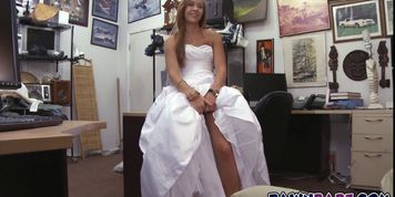 A sexy blonde dressed in a wedding gown went to the sho