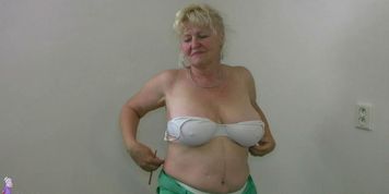 Chubby Grandma does strip in home gym