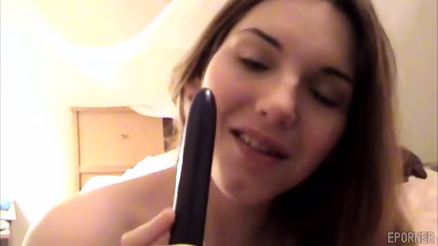 Brunette Teases With Vibrator In Bedroom