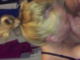 Busty tattooed granny sucking cock