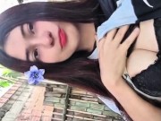 Porn actress Yulieth Gomez touches her breasts outdoors