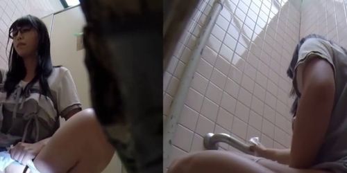 JAPAN PISS TV - Japanese babes caught on tape while pissing in public toilet