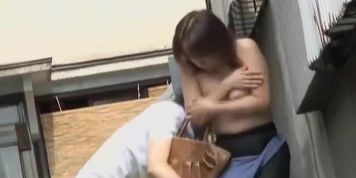 Busty Asian girl boob gets sharking on the street.