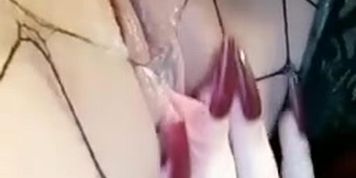 Wet goth pussy in fishnets