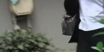 Slim Asian has girl boob sharking in broad daylight.