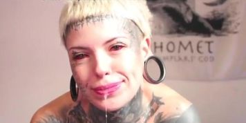 SPLITTED TONGUE GOTH TATTOO PIERCED FACE