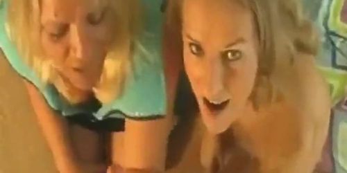 Two blonde housewives share a lad