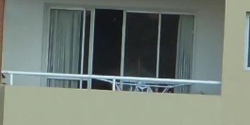 voyeur girl nude in balcony argentina . far away ( 2oo m)
