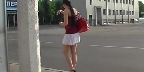 Glamorous brunette hair in street upskirt clip