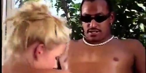 Sexy blonde gives black guy a great blowjob