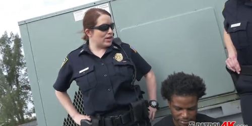 Horny female officers make thug fuck their pussies on rooftop