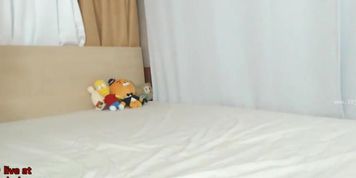 Asian camgirl plays with her sexy tits