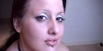 Chubby Goth Girl with Lip Piercing Swallows