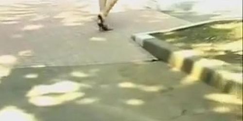 Desirous oriental skank loses her skirt when some sharking fella snatches it