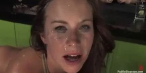 Busty brunette give handjobs in bar full of people