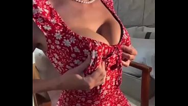 Stepmom in a sexy dress, her big tits look very beautiful