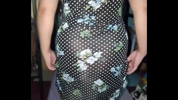 She lifts up her little dress so we can see her sexy ass