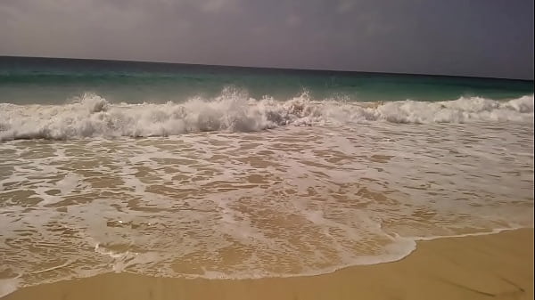 Wife on the beach in swimsuit