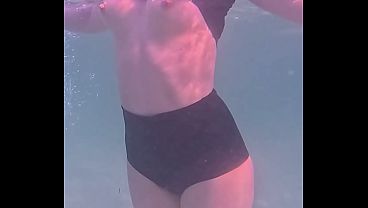 Amateur long legs perfect body girl's relaxing underwater swimming
