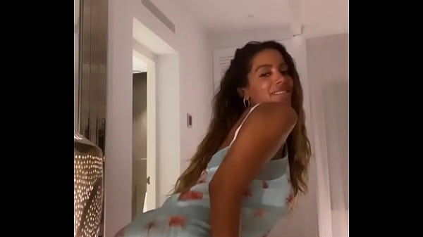 Anita swaying in her dress