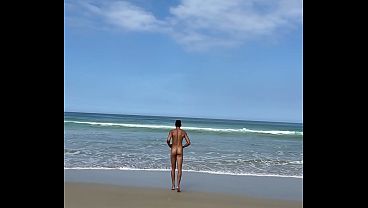 Naked guy on the beach