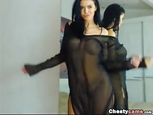 Brunette shows her perfect body behind her clothes